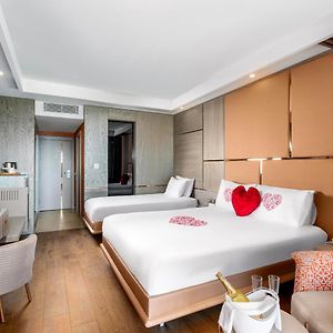 Kamer met een Queen Size Bed voor Pasgetrouwden